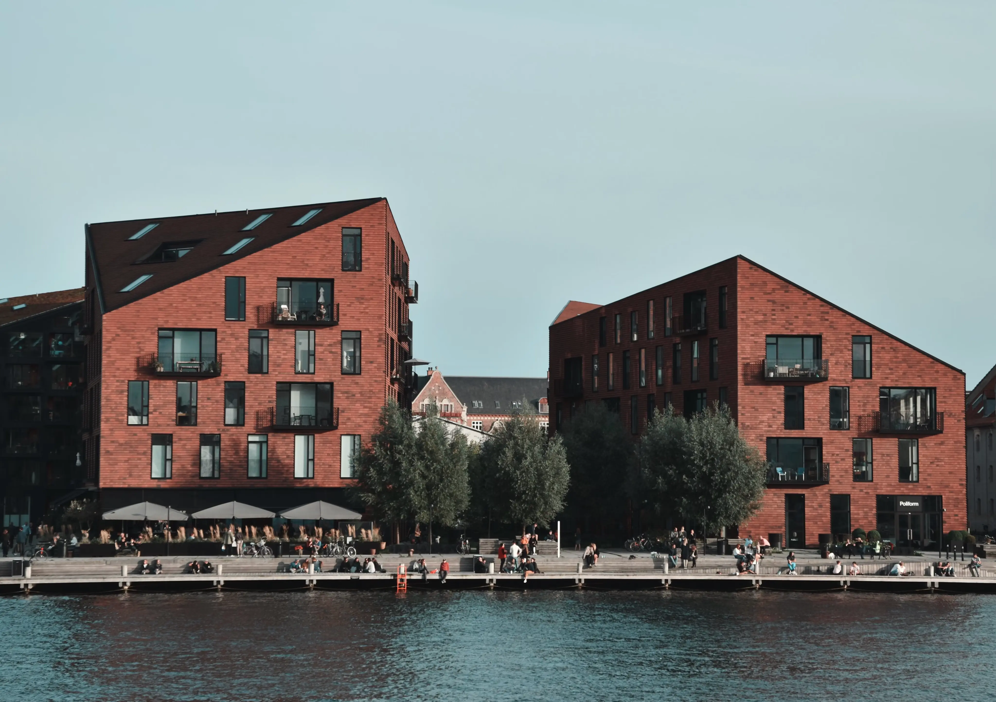 Modern red brick waterfront buildings in Copenhagen.