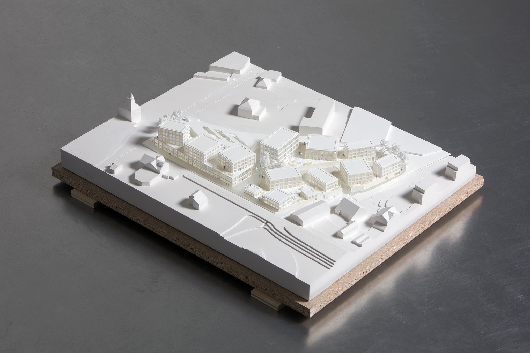 XDGA, ensemble de logements et commerces à Estavayer 