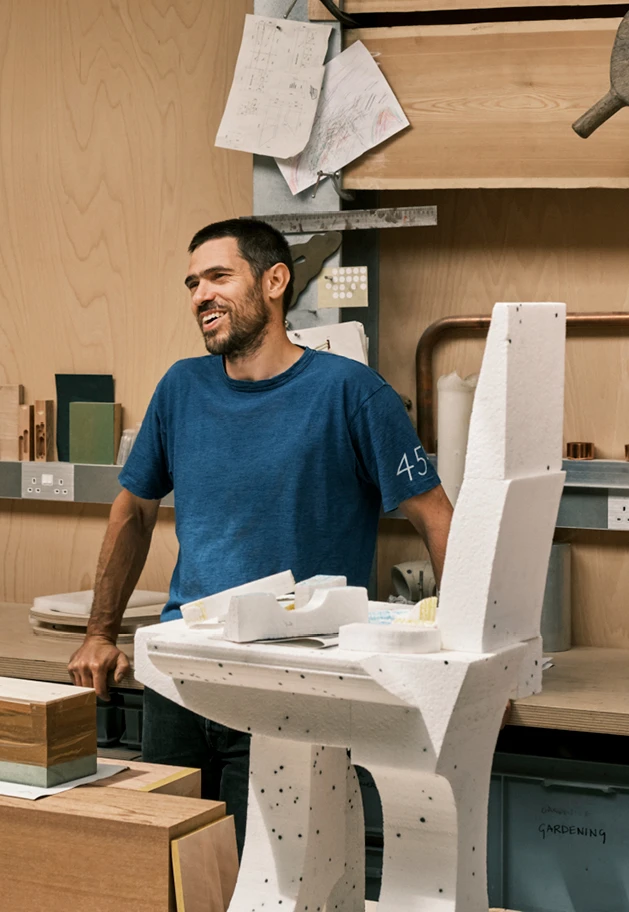 Furniture designer Max Lamb with a model of his 6X8 chair