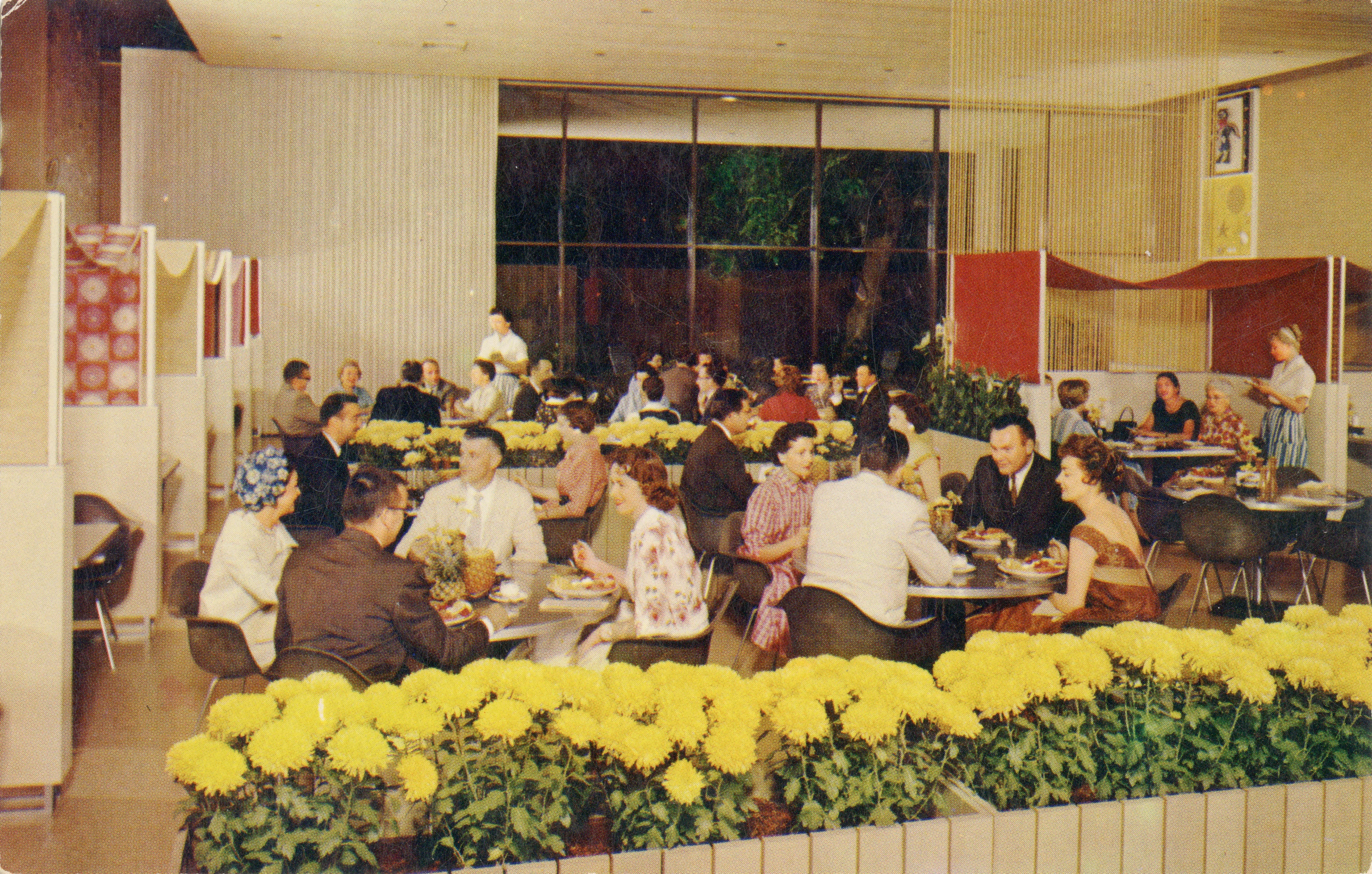 Postcard with an additional view of The Nut Tree dining room filled with Eames chairs, and Alexander Girard draped textiles,