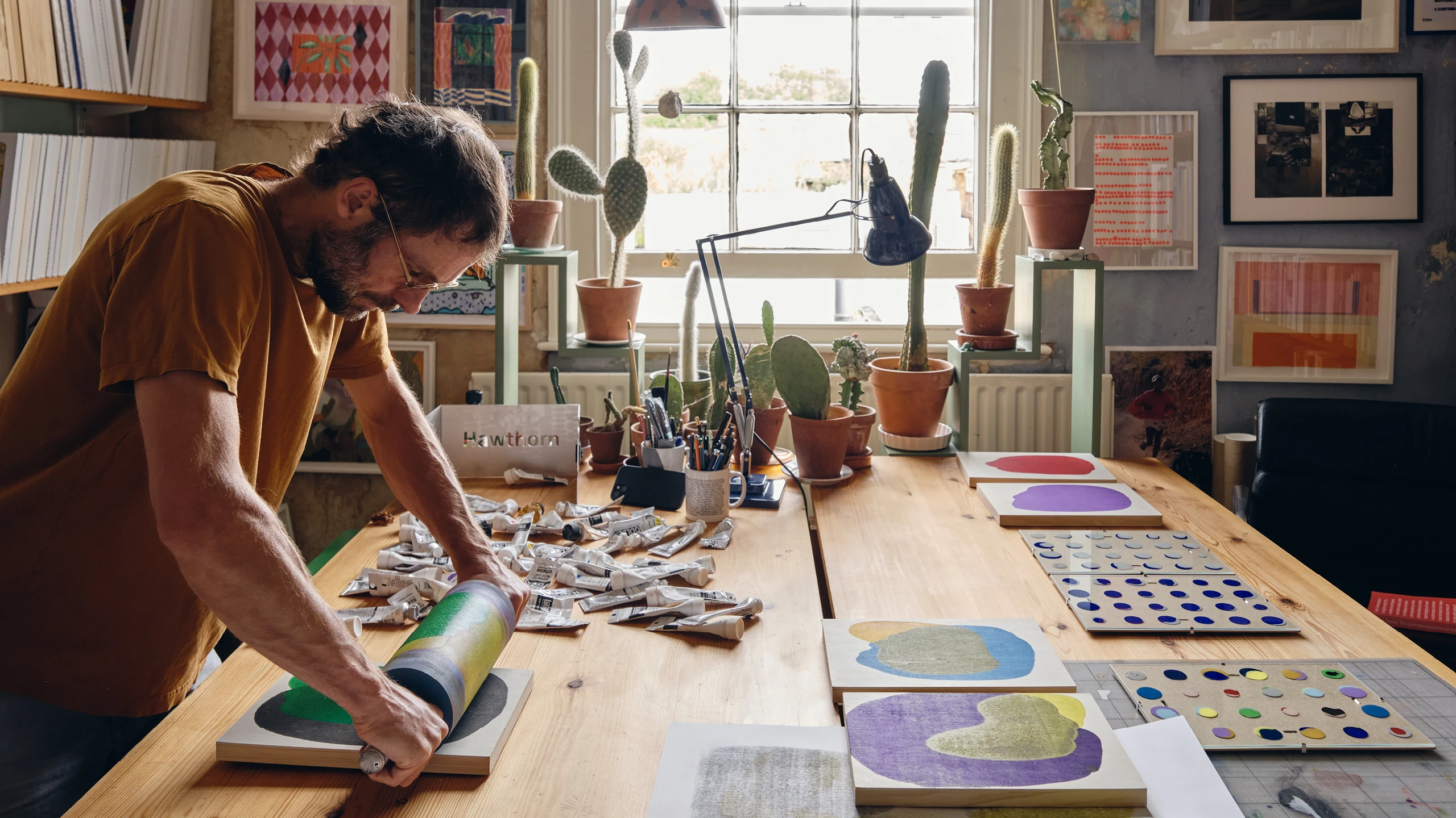 Artist Daniel Eatock in his London art studio demonstrating his art-making process while making a Rolling Pin Painting.