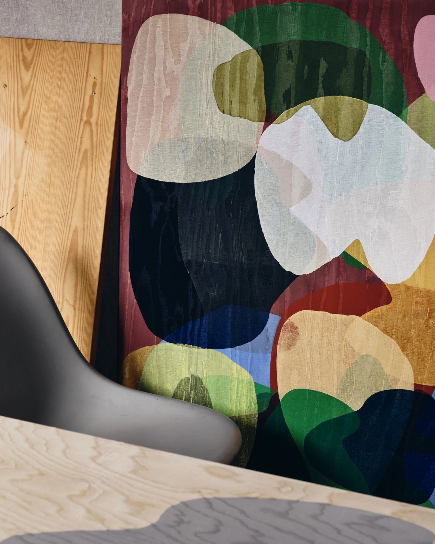 Artist Daniel Eatock’s London art studio featuring one of his many colorful Rolling Pin Paintings.