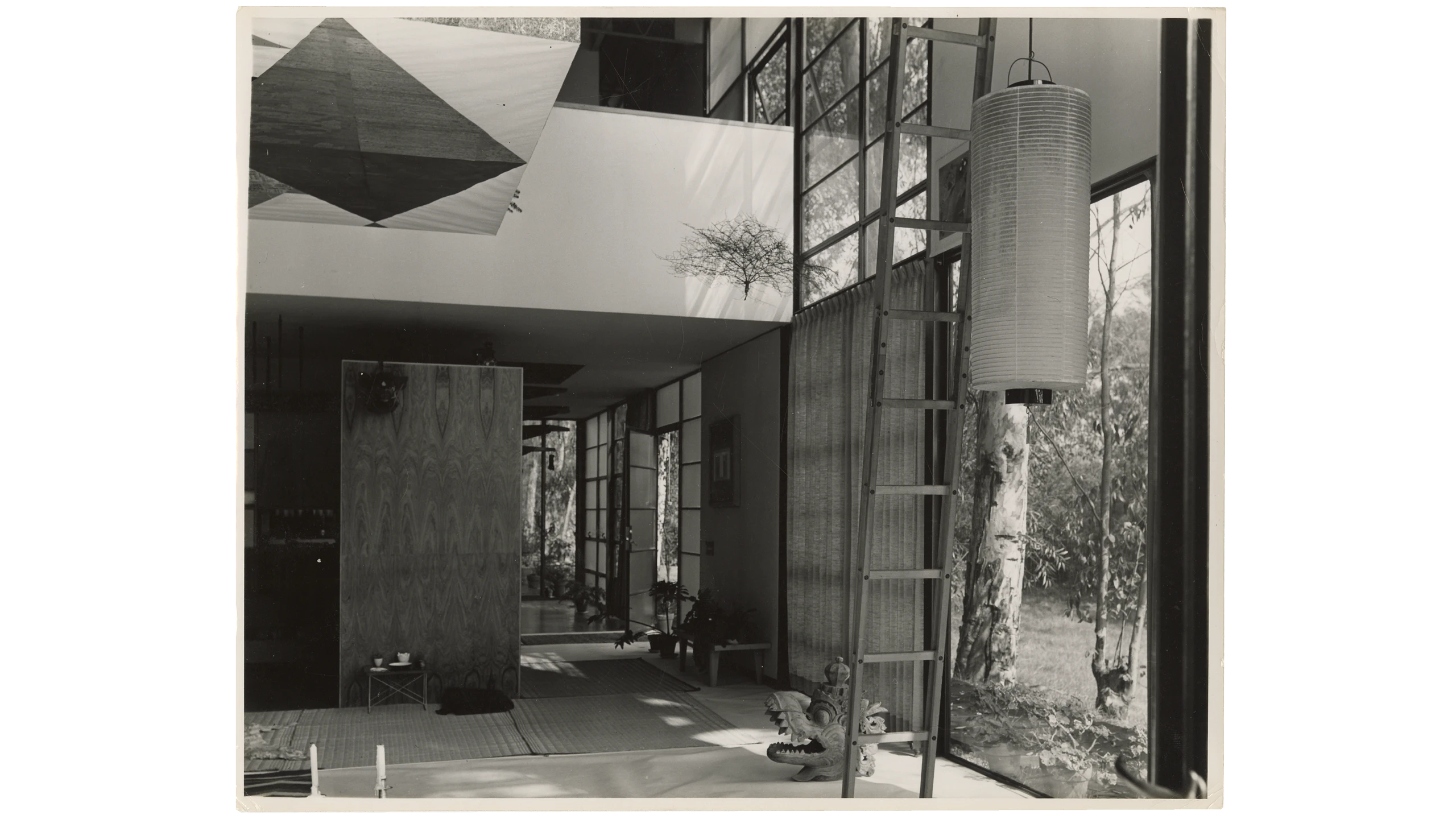 Eames Case Study House 8 interior featuring a wall of windows.