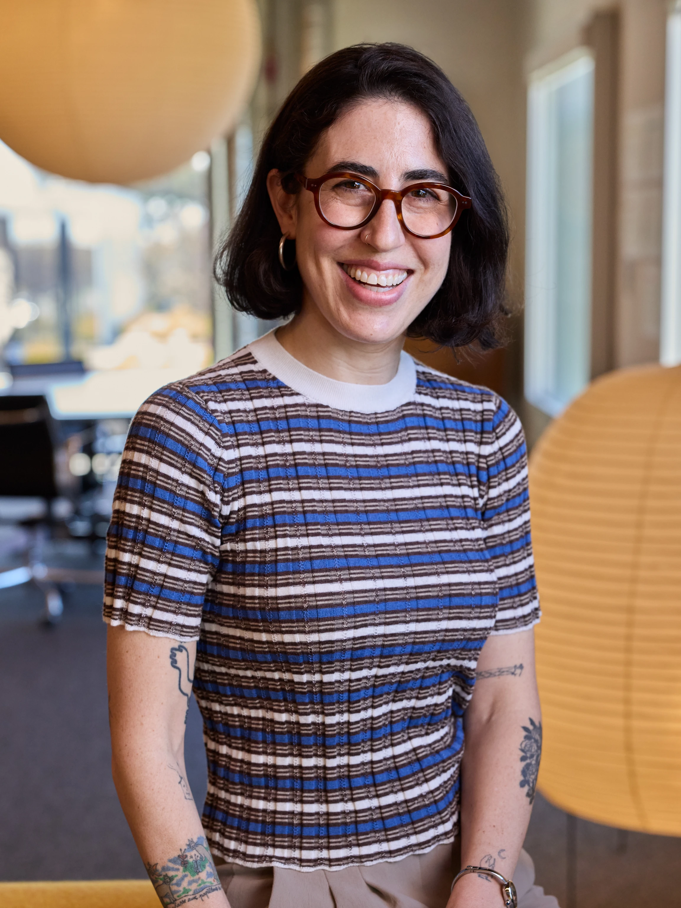 Seated portrait of Zoe Minikes.