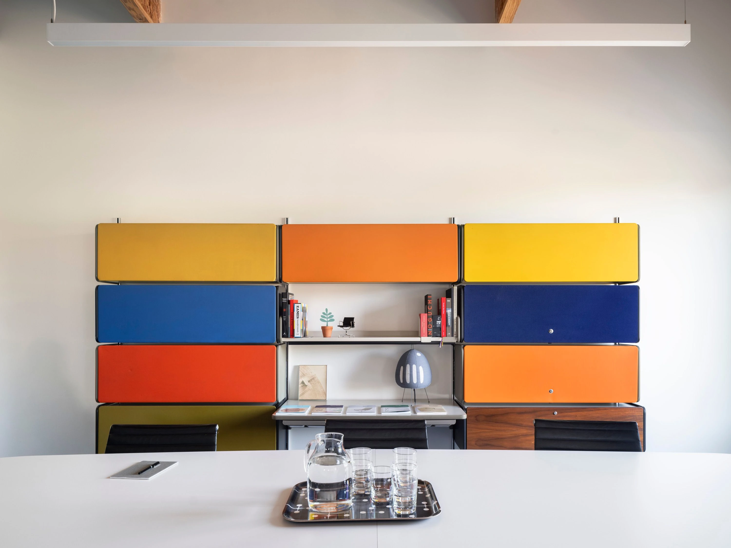 Multi-color storage unit in a large Conference Room at the Eames Institute in Richmond California.