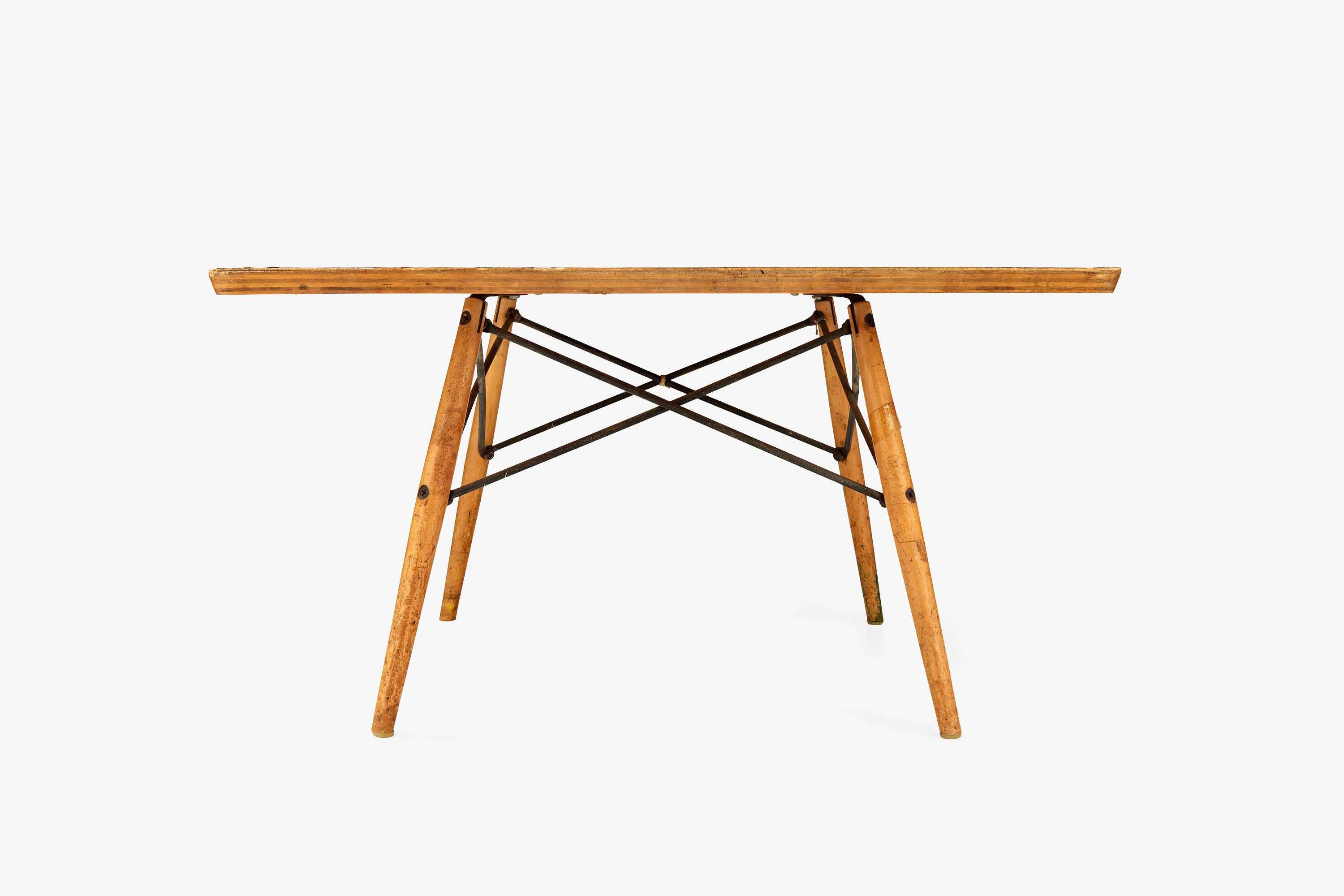 Prototype for the Eames Alcove Table with birch plywood top, birch dowel legs, and steel rod wire stabilizers.