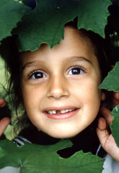 Close up of Llisa Demetrios, granddaughter of Charles Eames, as a young girl, Kazam! Magazine.