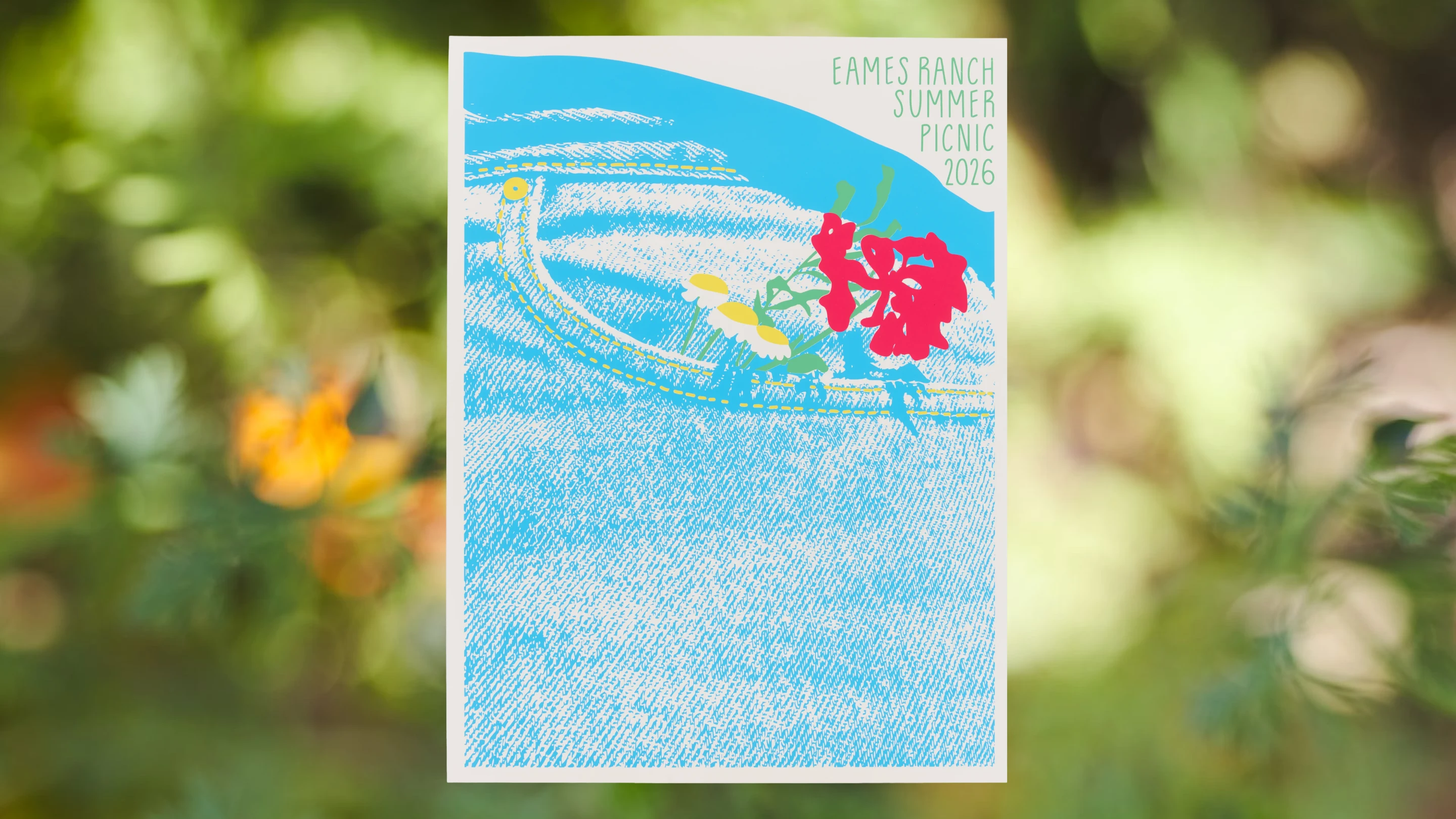 Eames Institute 2026 summer picnic poster design by Chloe Looker, featuring a close up of a pair of jeans with flowers in the background.
