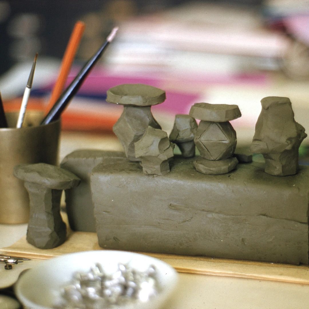 Eames stool mock-ups rendered in plasticine on Ray Eames’s worktable from May 1960. Image © Eames Office, LLC