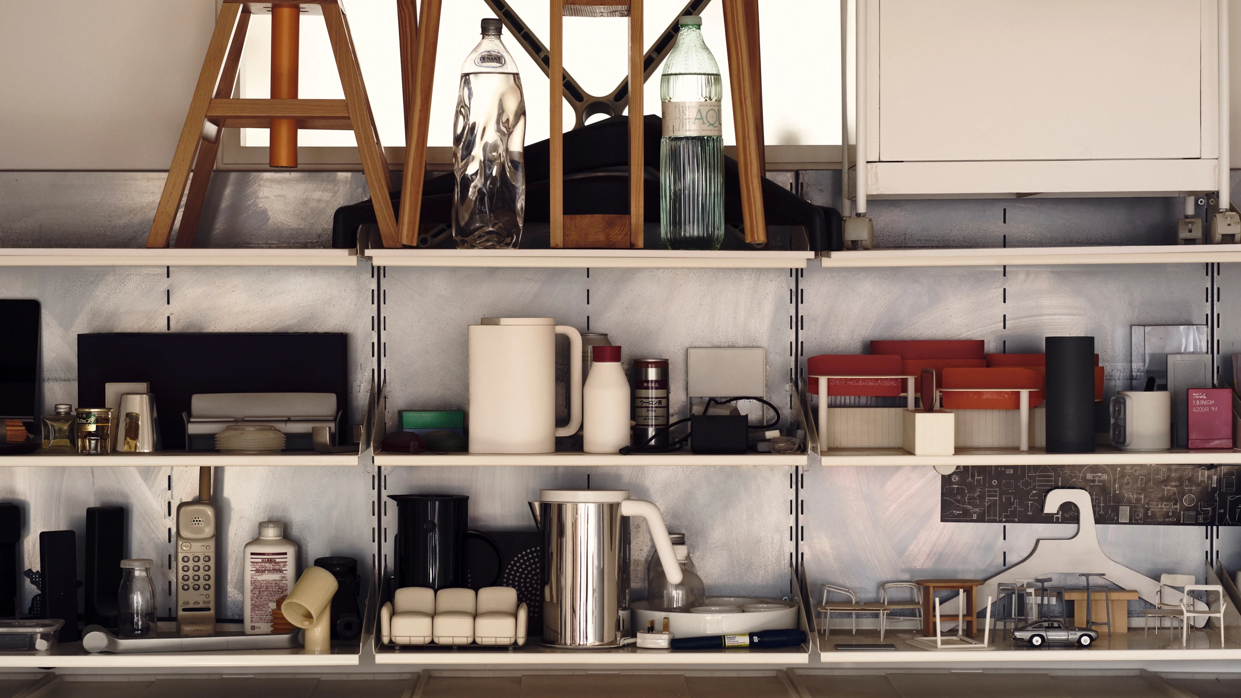 Shelves at design studio Industrial Facility featuring their designs and prototypes for many objects—Kazam! Magazine.