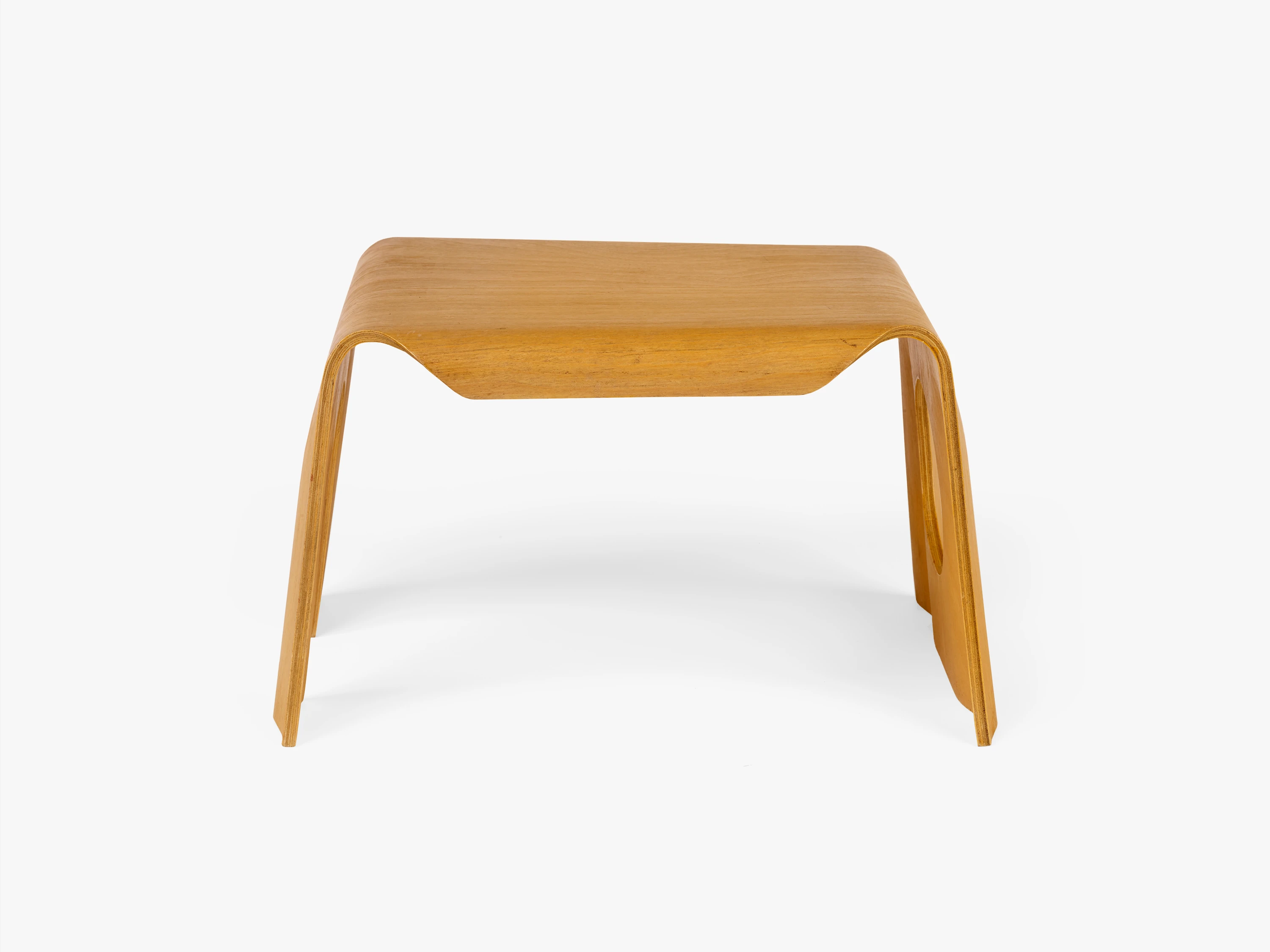 Front on view of the Eames Child’s Stool in Spruce plywood.