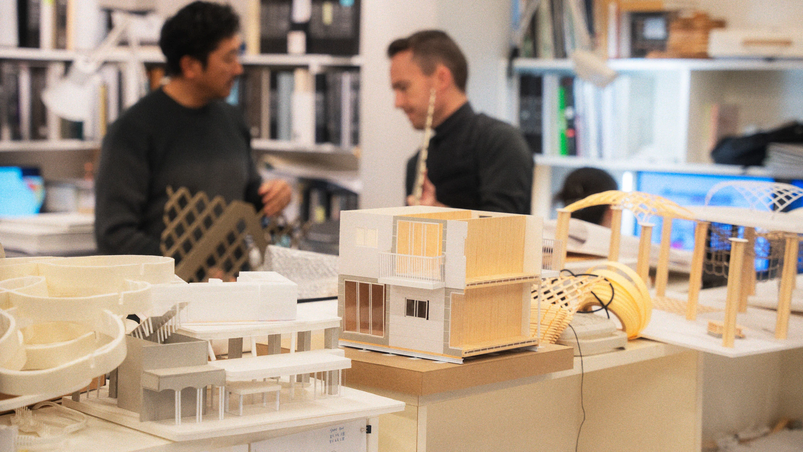Several architectural models on display at the office of Shigeru Ban Architects.