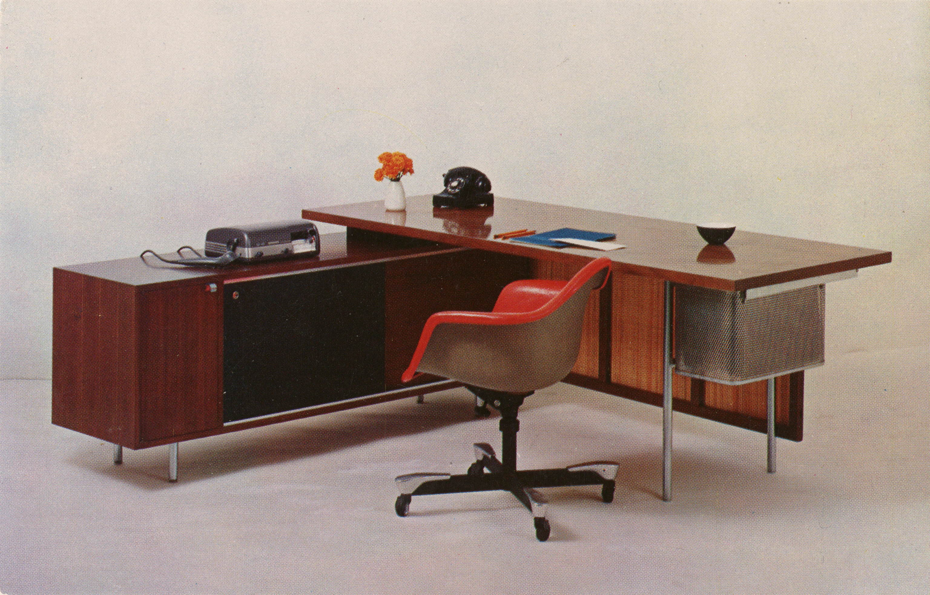 Herman Miller promotional postcard for George Nelson’s Executive Office Group furniture includes an Eames DAT-1 desk chair.