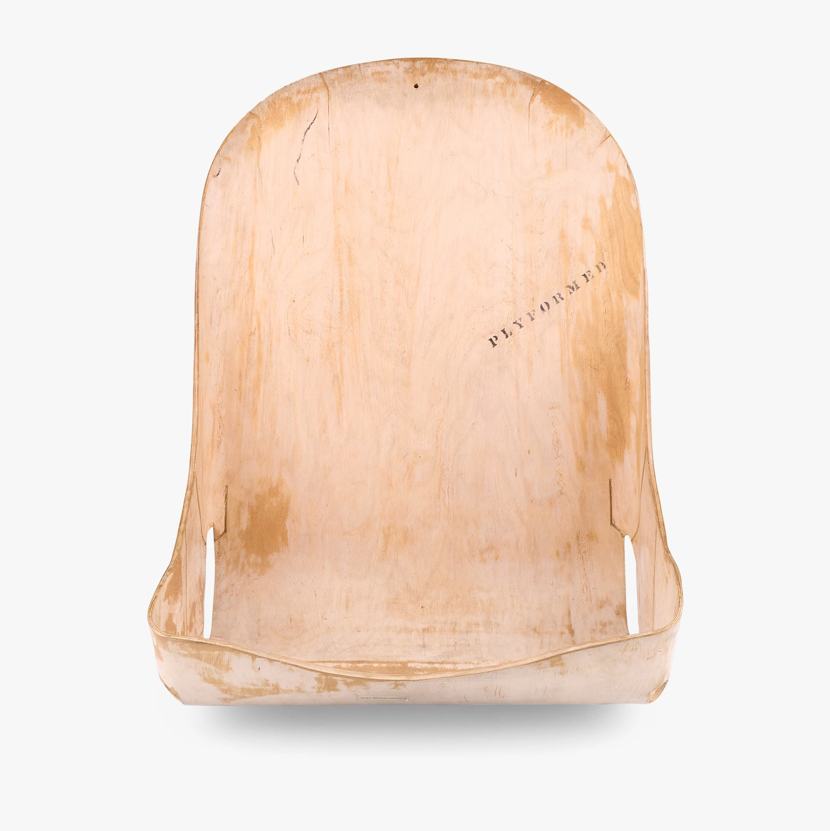 Front view of the 1948 Eames designed molded birch plywood airplane seat prototype that was never manufactured.