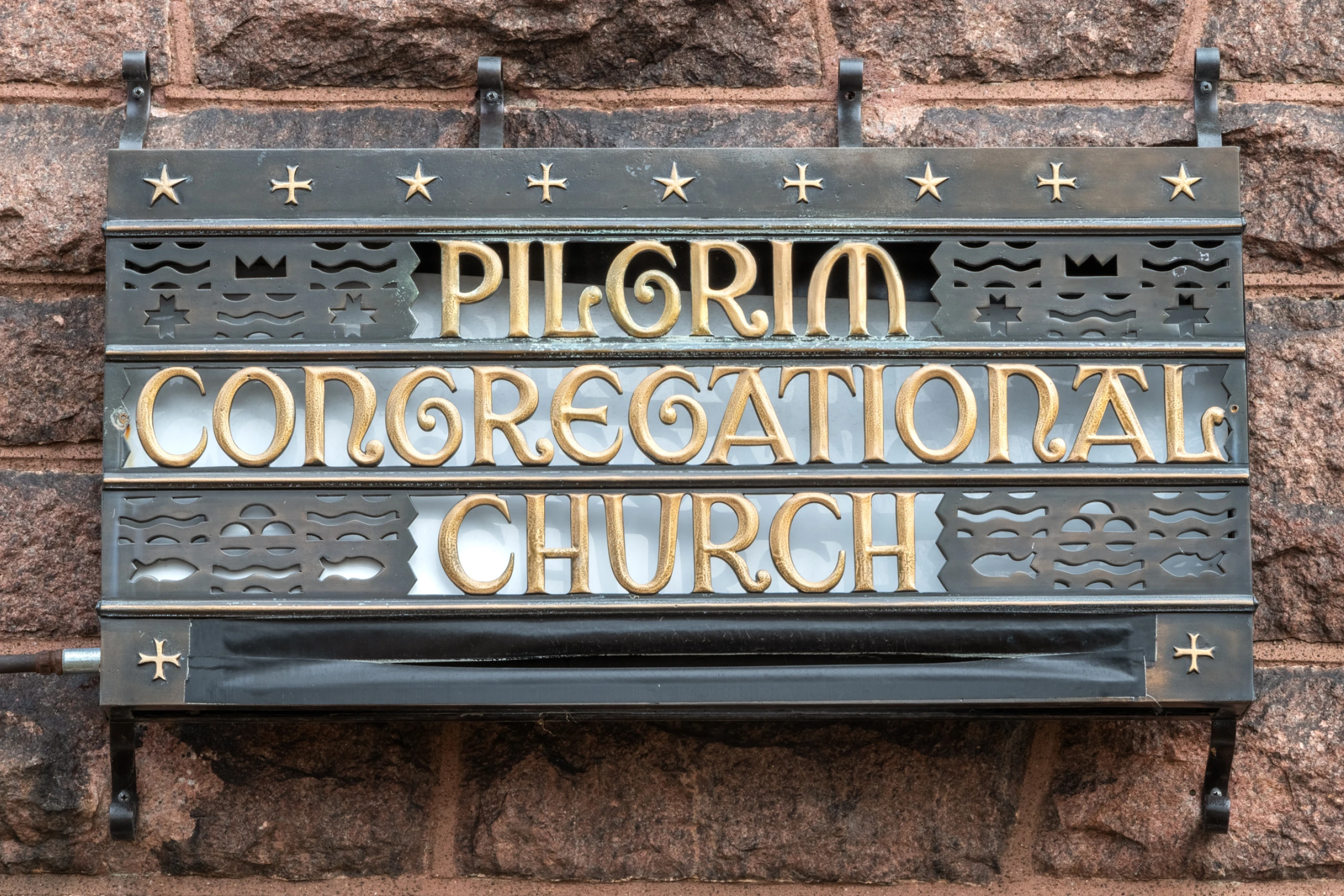 Copper sign for the Pilgrim Congregational Church designed by Charles Eames.