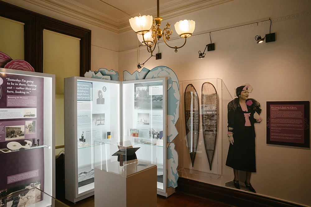 Cases containing artifacts from "Petals and Ice" exhibition about Louise A. Boyd, explorer, geographer, and photographer.
