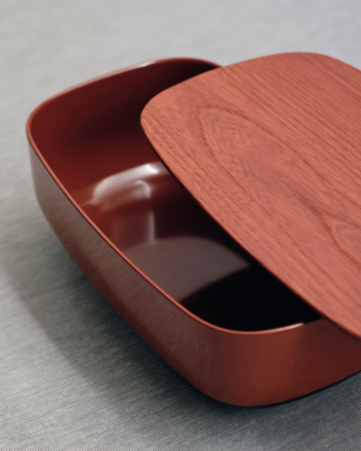 Modern oval storage container with wood top from design studio Industrial Facility—Kazam! Magazine.