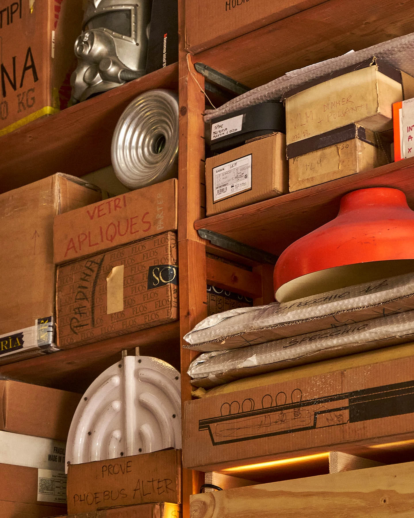 Shelves at the Achille Castiglioni Foundation studio are packed tightly with prototypes, designs, and reference materials.
