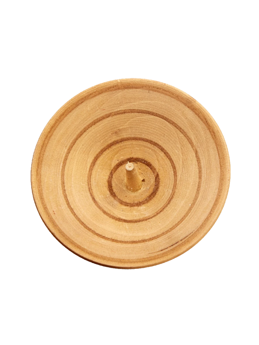 Wooden Japanese top with painted concentric stripes, one of the many tops collected by the Eameses.