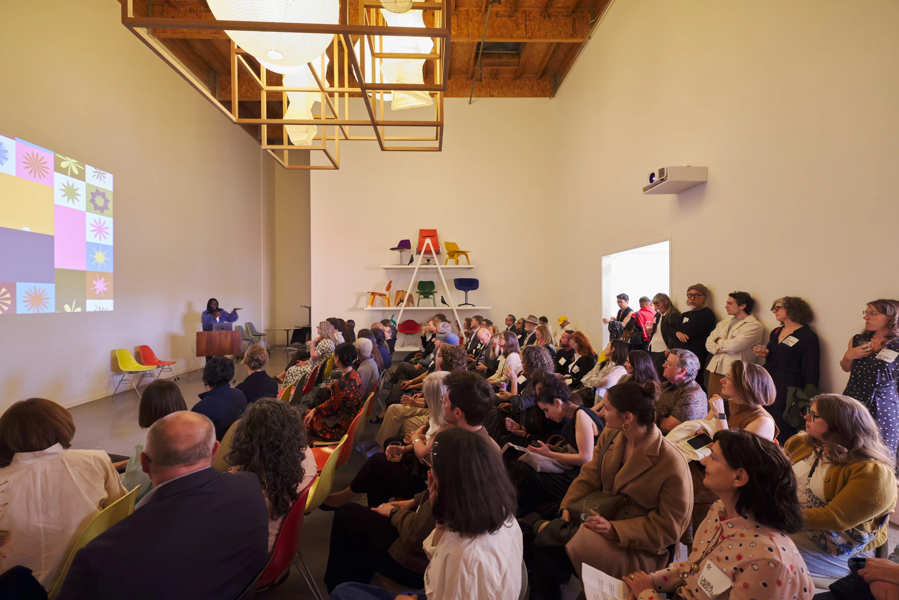 Guests attend a presentation in the Eames Institute Connections Center, where talks, workshops, and gatherings are hosted.