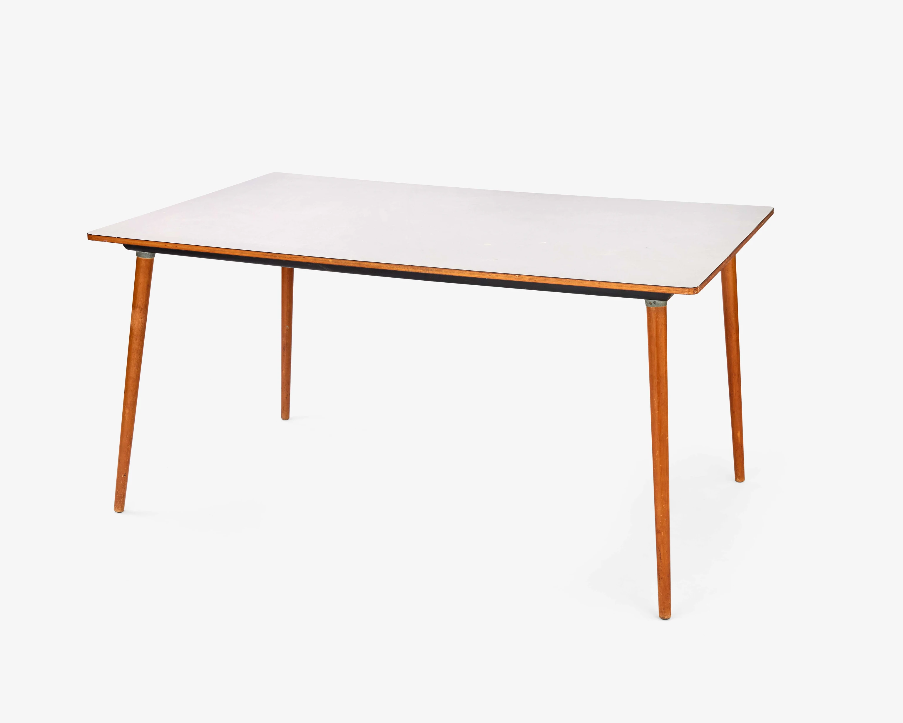 Three quarter view of the Eames DTW-30 Table with a plastic laminate top and solid birch dowel legs.
