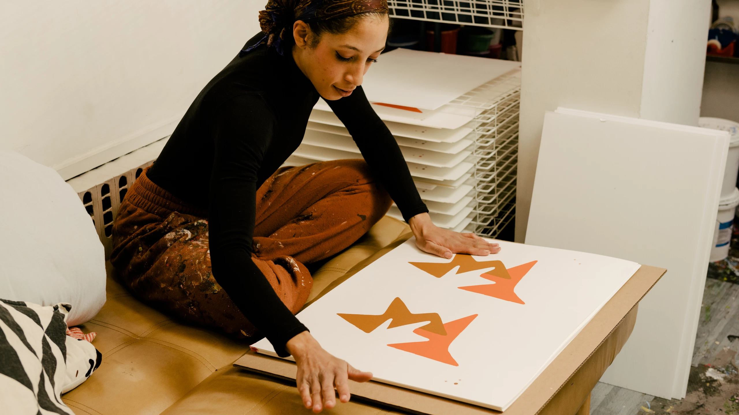 Leslie Diuguid, founder of Du-Good Press in Brooklyn, reviewing an in progress print.