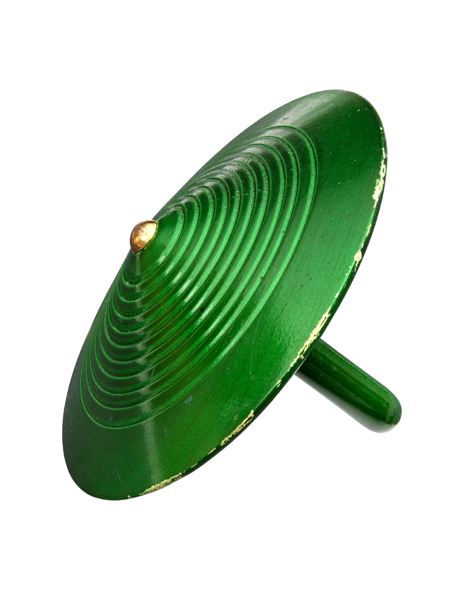 Green Swiss top made of wood with a brass tip is one of many tops collected by the Eameses.