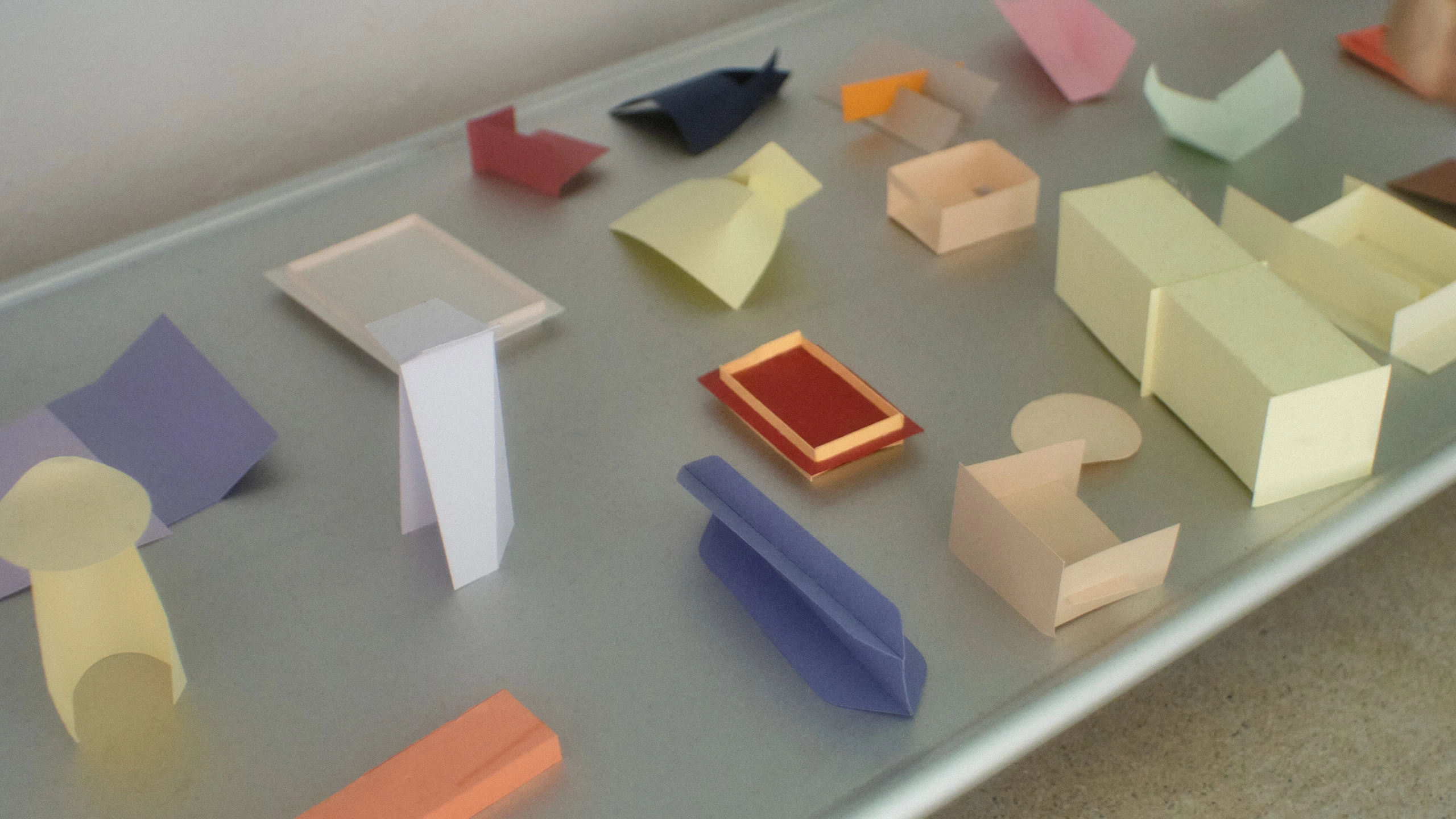 Colorful paper mockups from various collections (Delta, Ore Streams, Maison Matisse, Cassina) by design studio Formafantasma.