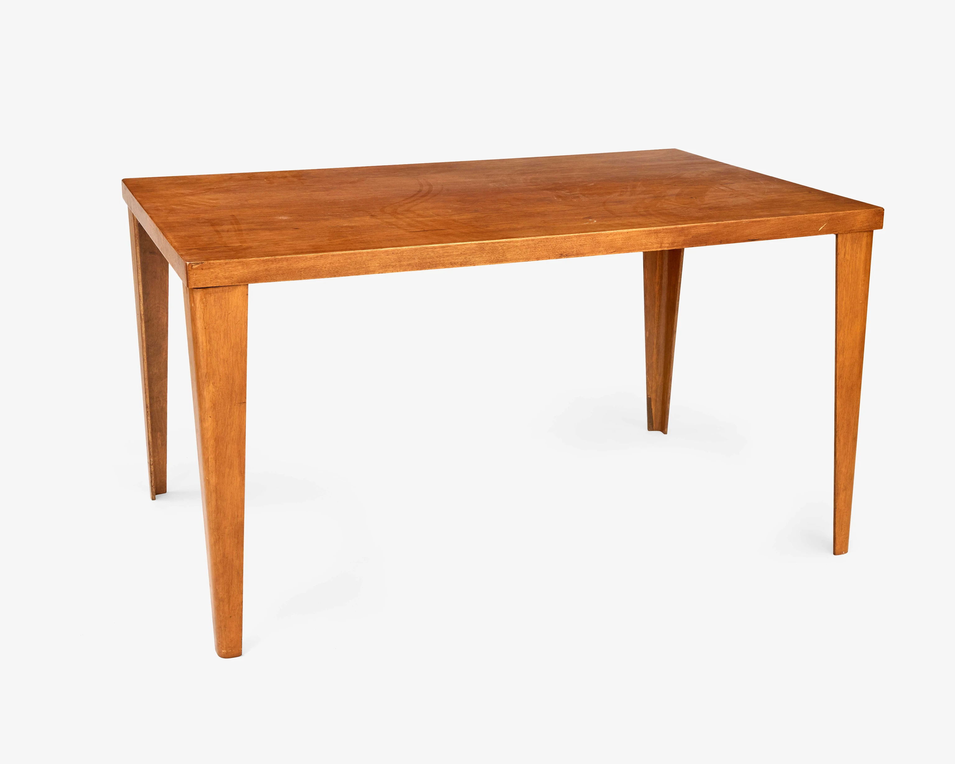 Eames DTW-1 dining table made of walnut plywood was among the first commercial tables designed with detachable legs.