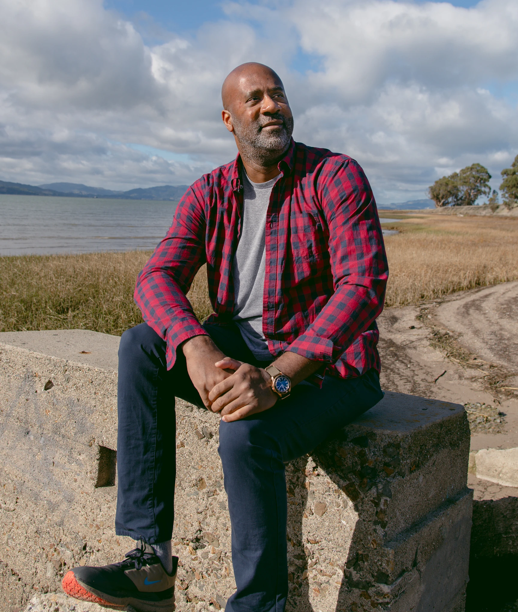 Maurice Woods of Inneract Project sitting in an outdoor setting.