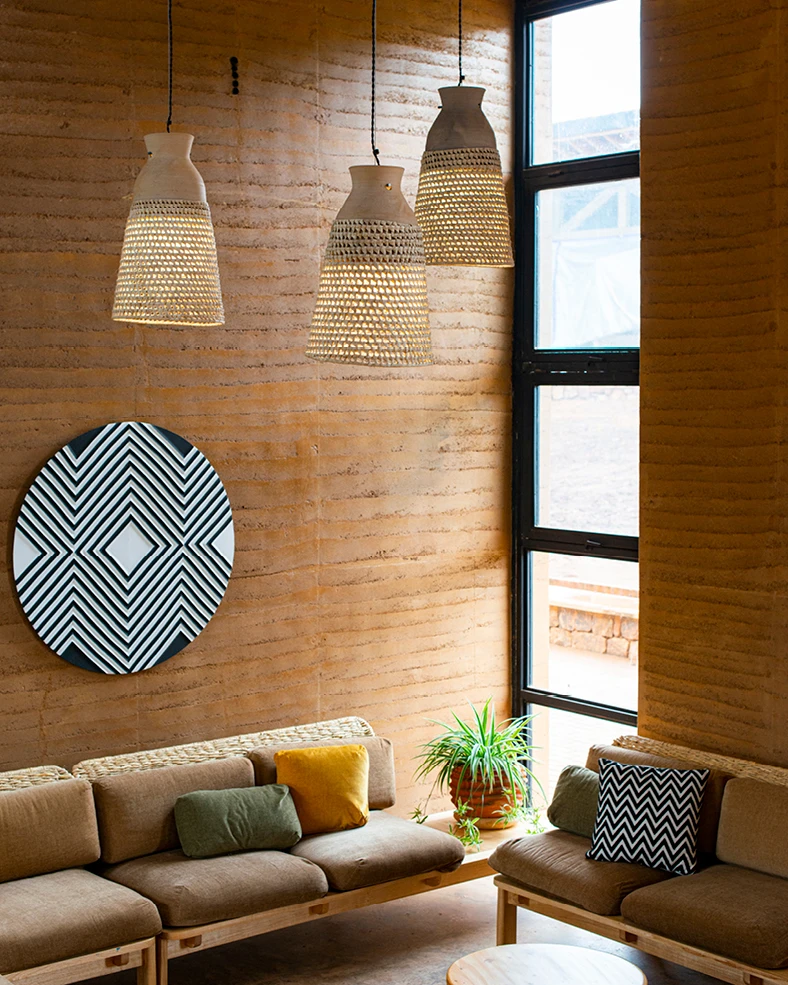 Interior of Rwanda Institute for Conservation Agriculture building decorated with local modern furnishings.
