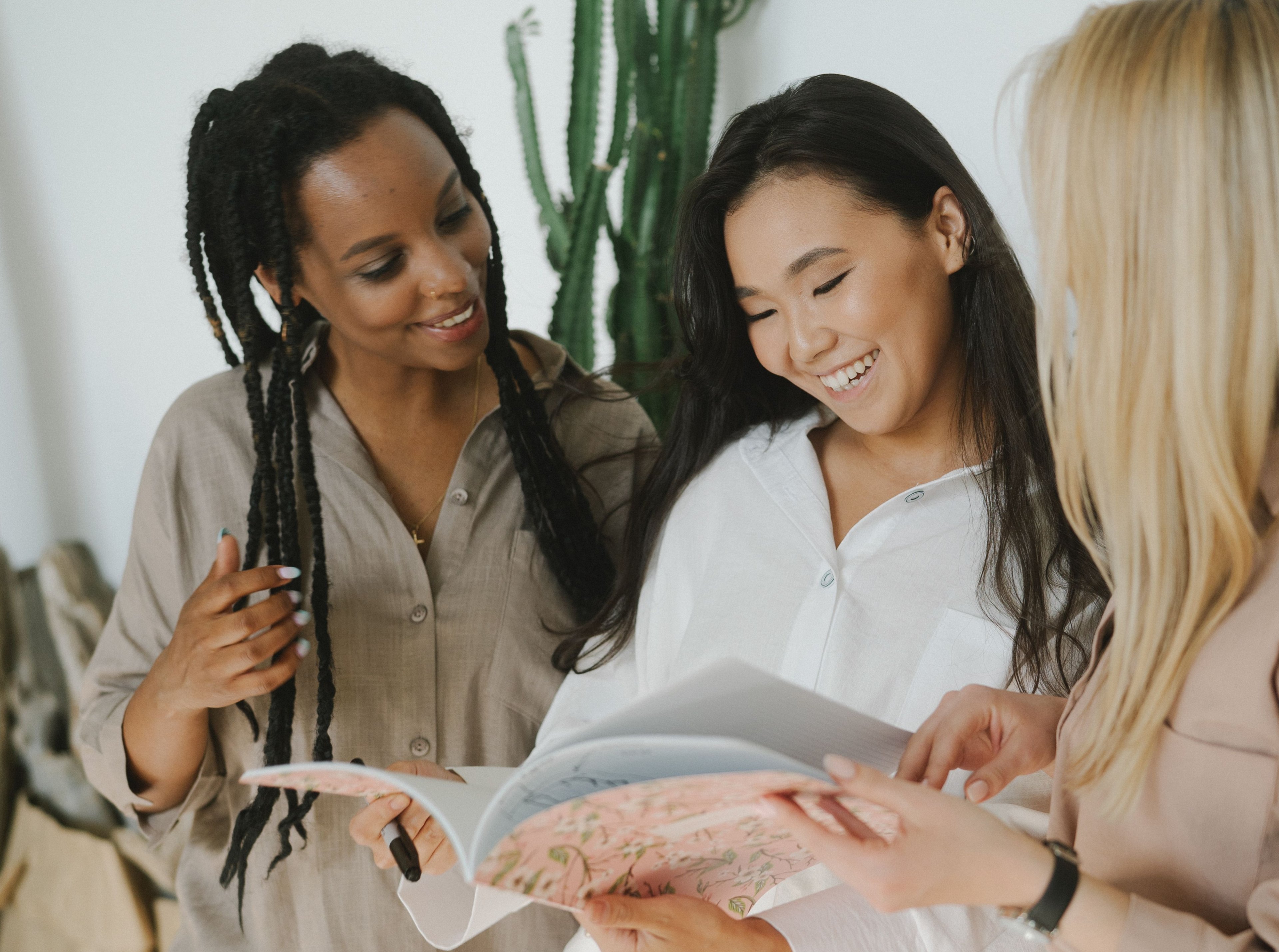 Two women reviewing materials together