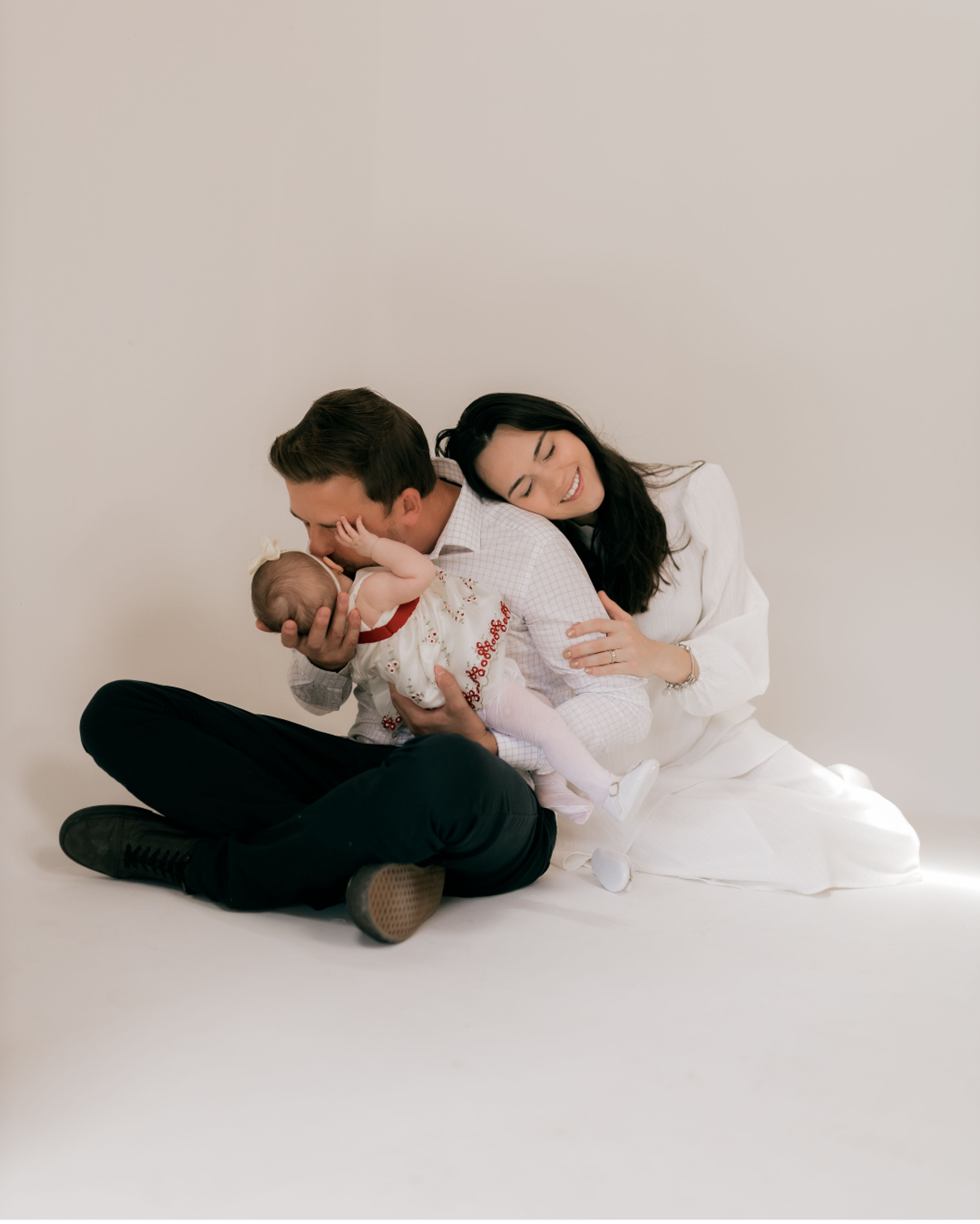 family holding baby