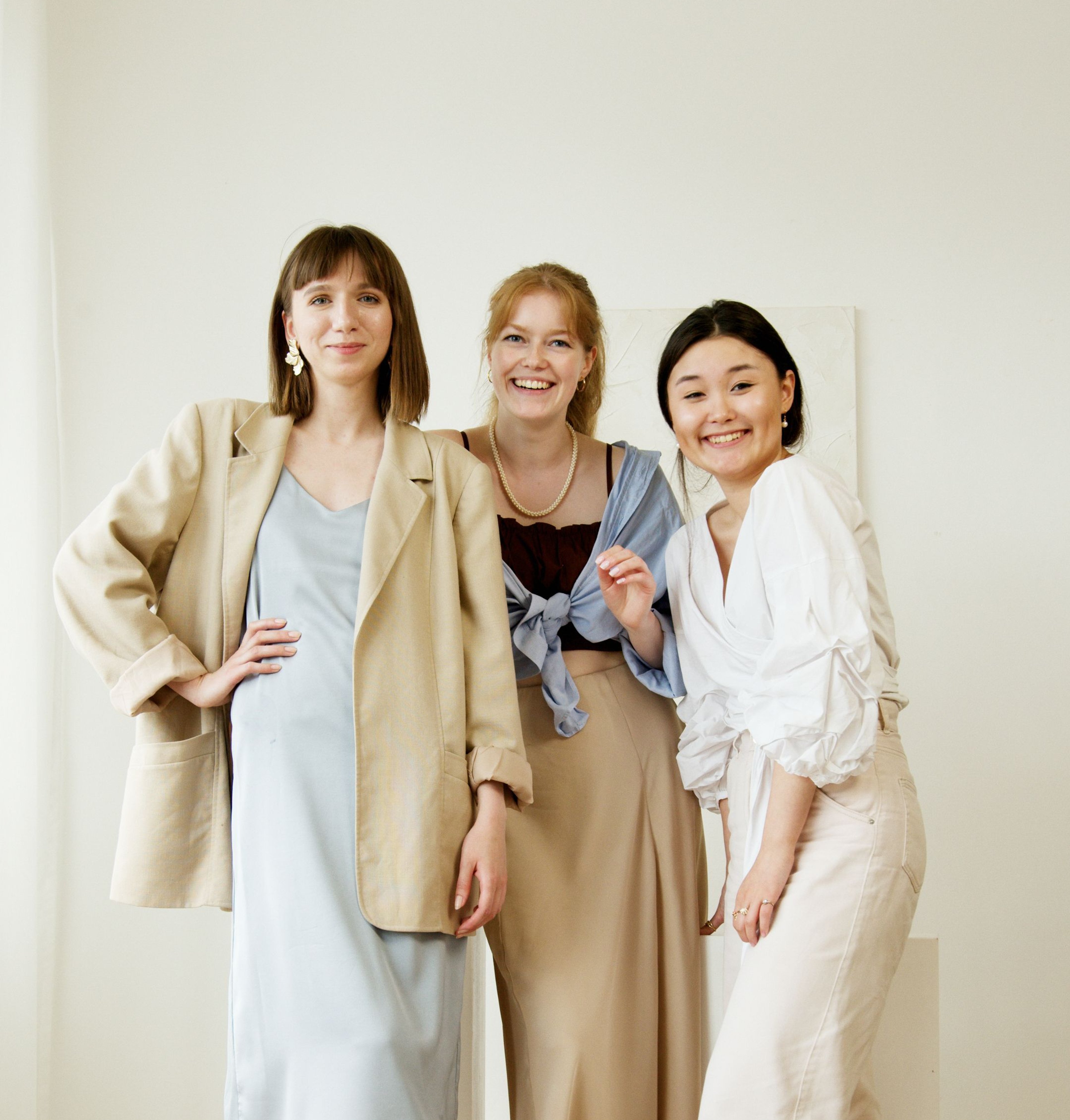 Three women smiling together