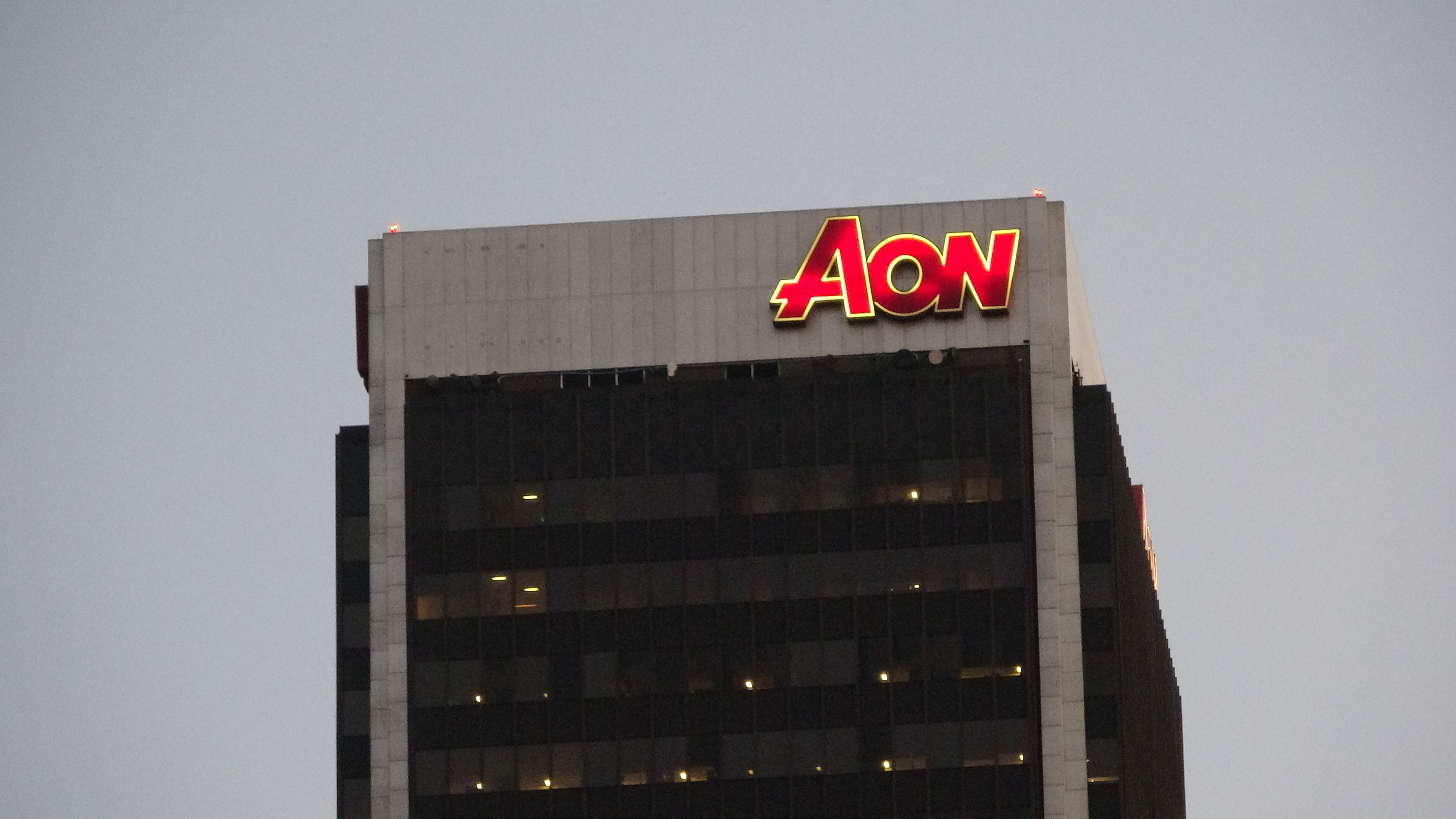 Global insurance broker Aon tests stablecoin payments with Coinbase, Paxos