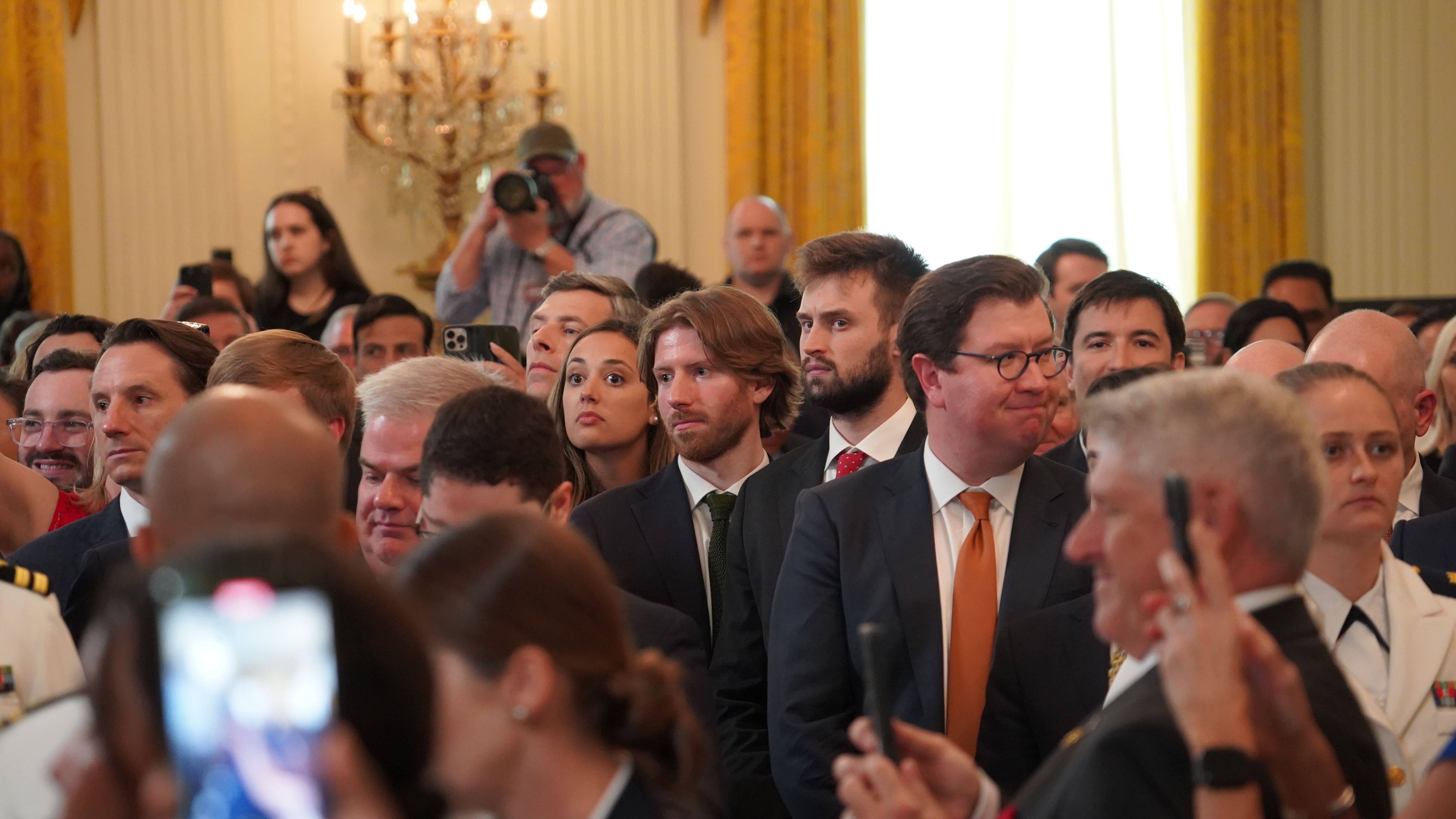 Attendees watching as Donald Trump enters the East Room of the White House ahead of signing the GENIUS Act into law. (Nikhilesh De/CoinDesk) Attendees watching as Donald Trump enters the East Room of the White House ahead of signing the GENIUS Act into law. (Nikhilesh De/CoinDesk)