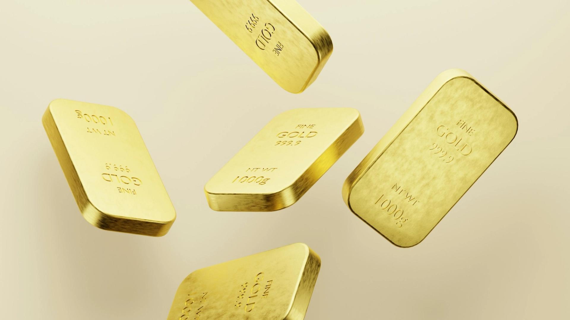 Gold bars representing the gold backing of the USDKG stablecoin