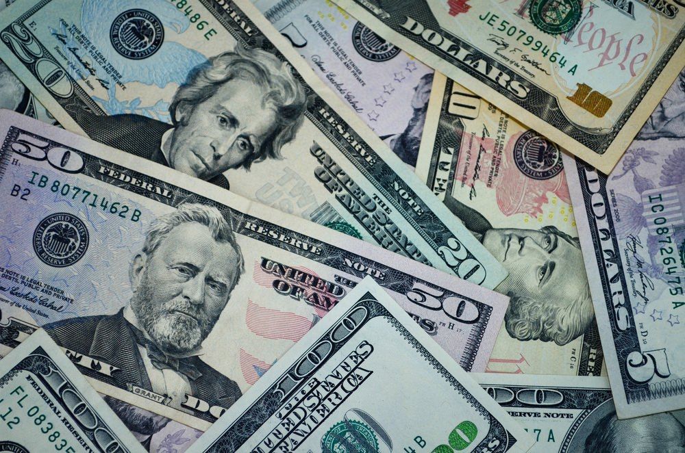 cash pile (Unsplash)