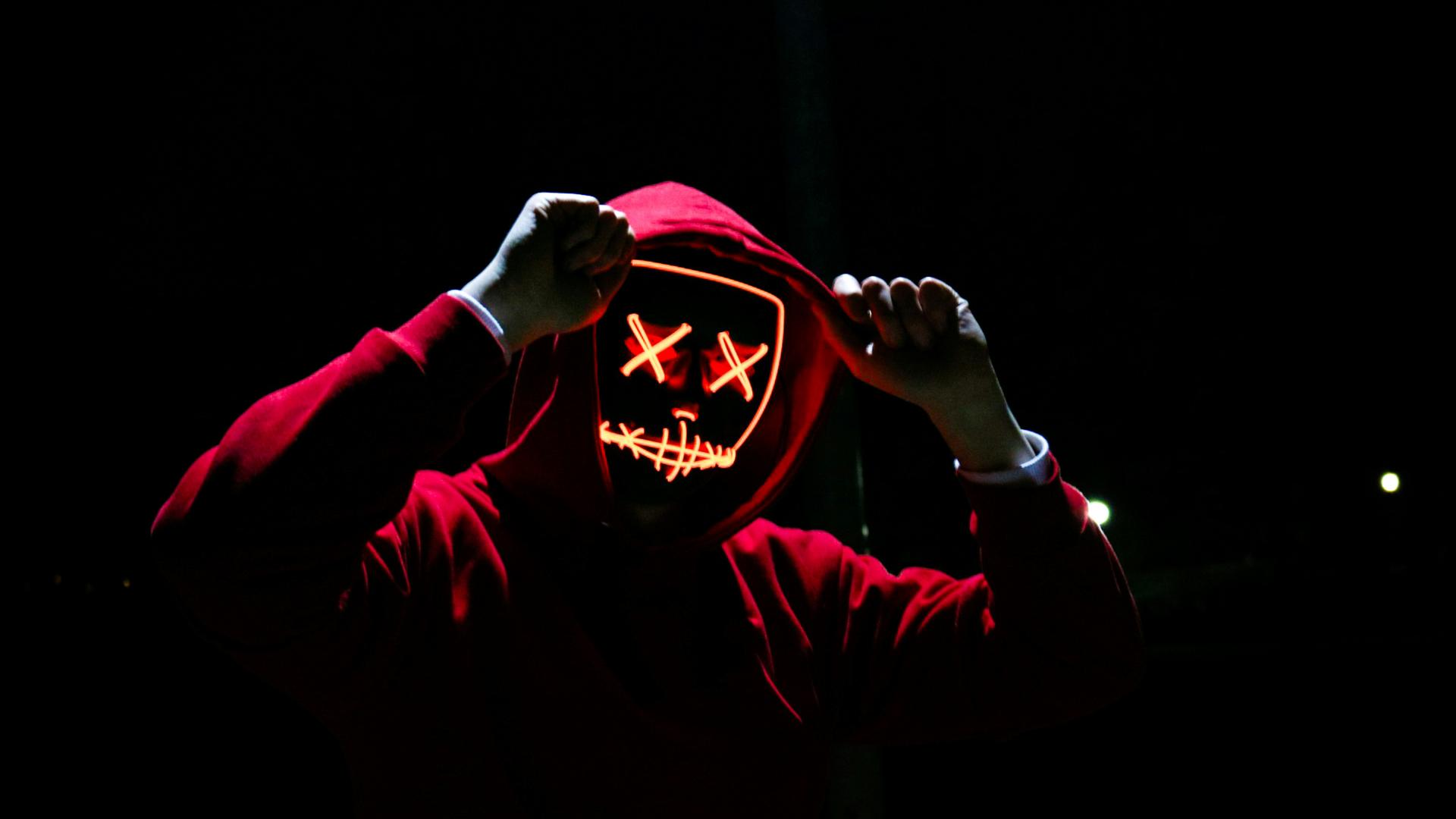 A figure wearing a red hoody (Sebastiaan Stam/Unsplash)