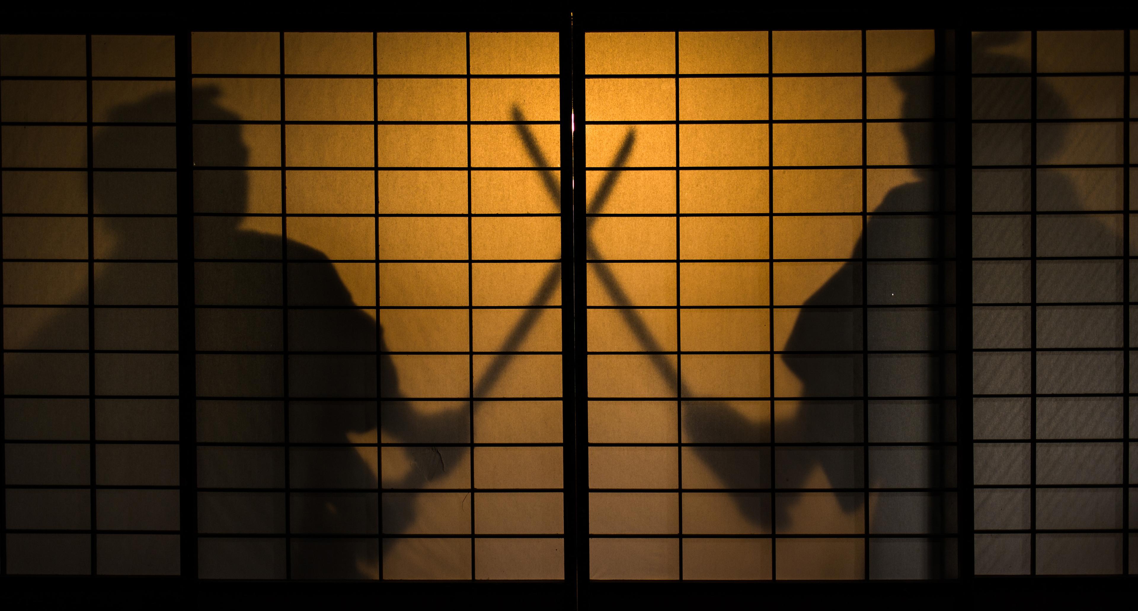 Silhouette of two samurai fighting, representing the Samourai Wallet case
