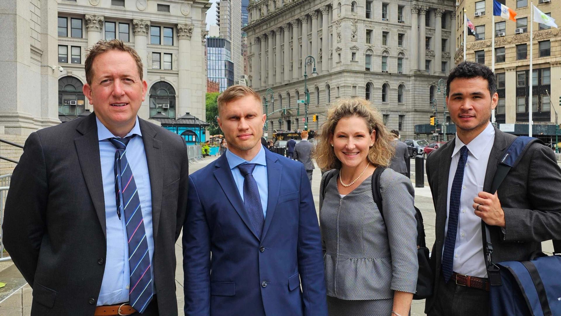 Tornado Cash's Roman Storm and legal team outside court