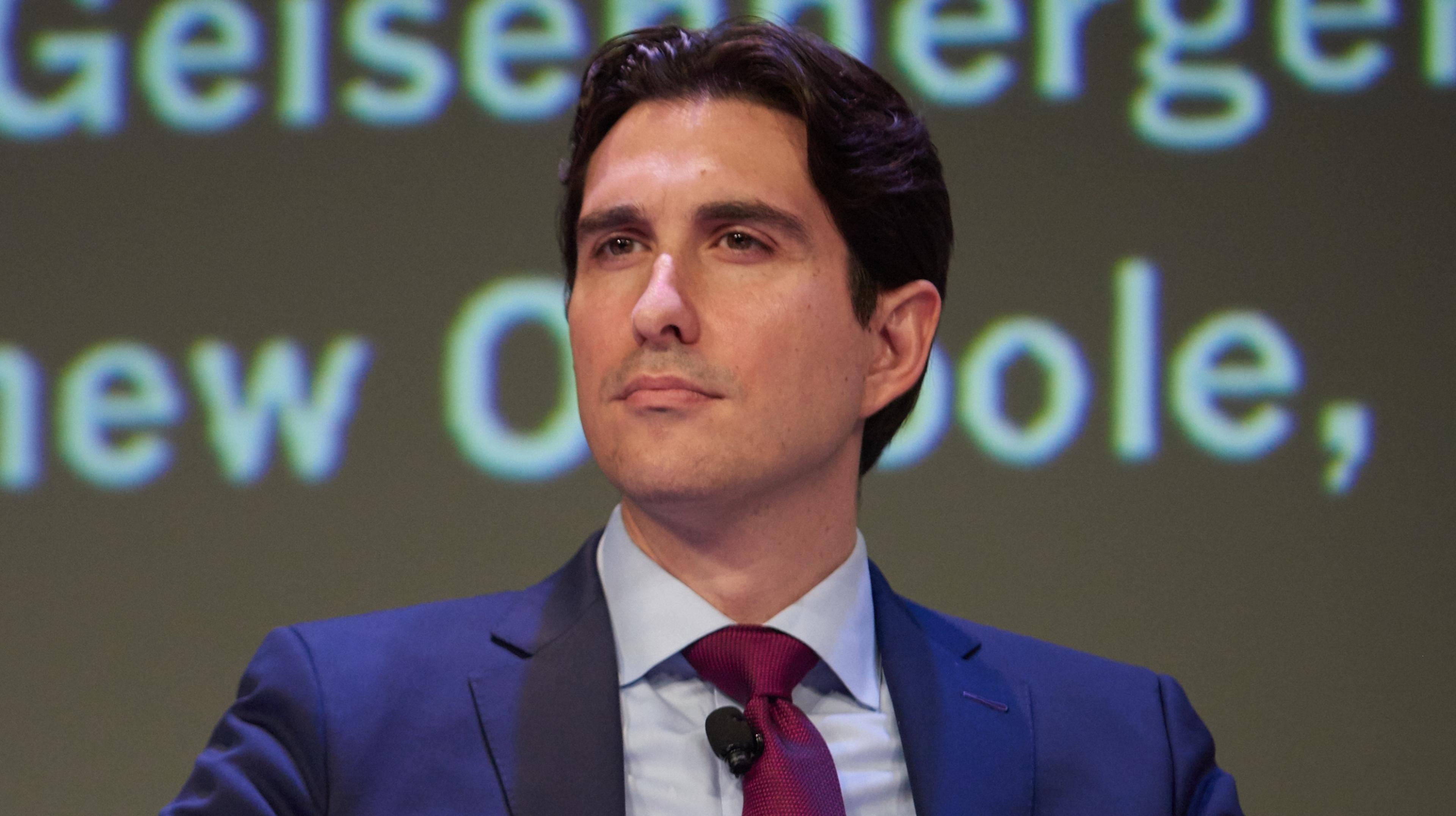 Marco Santori in a suit and tie