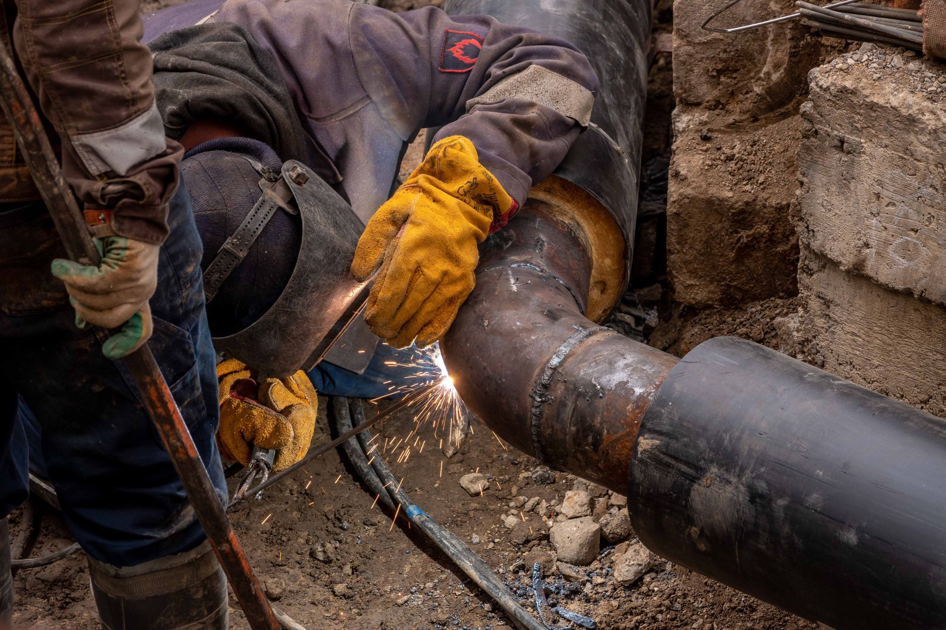 A skilled tradesperson at work on a job site.