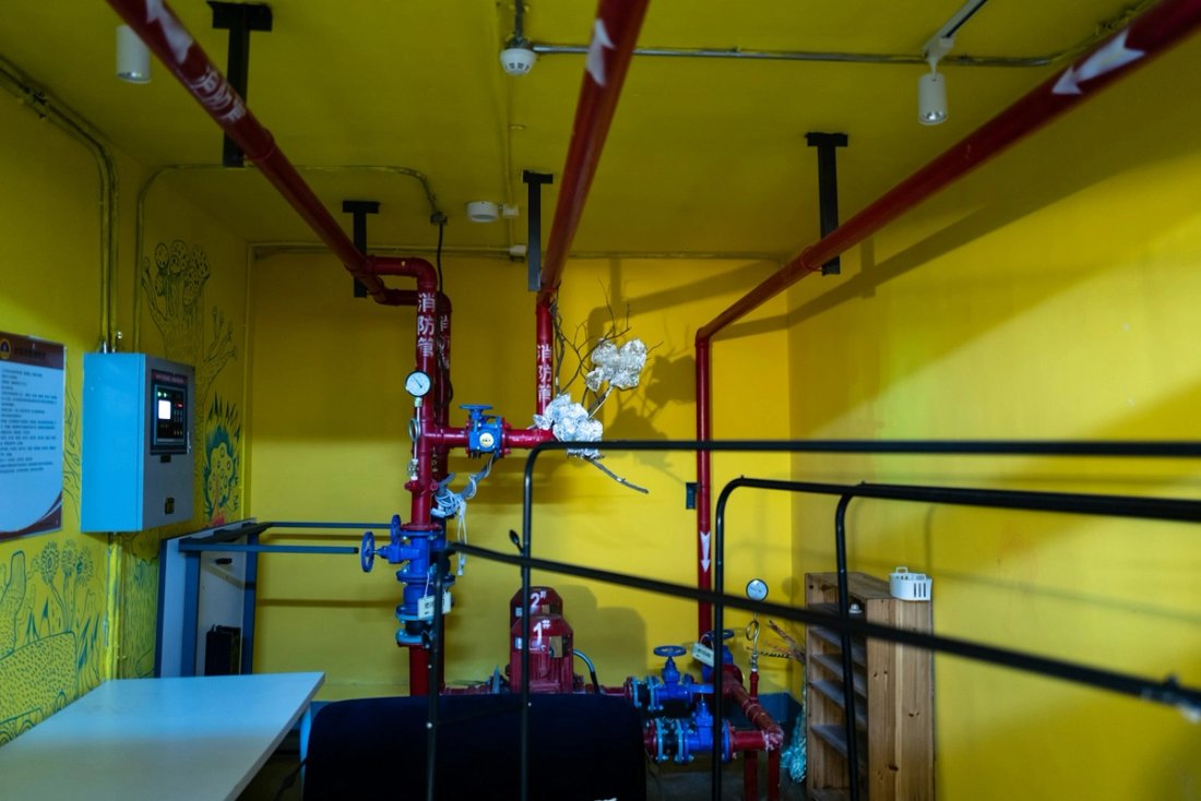 Fire protection technician inspecting equipment
