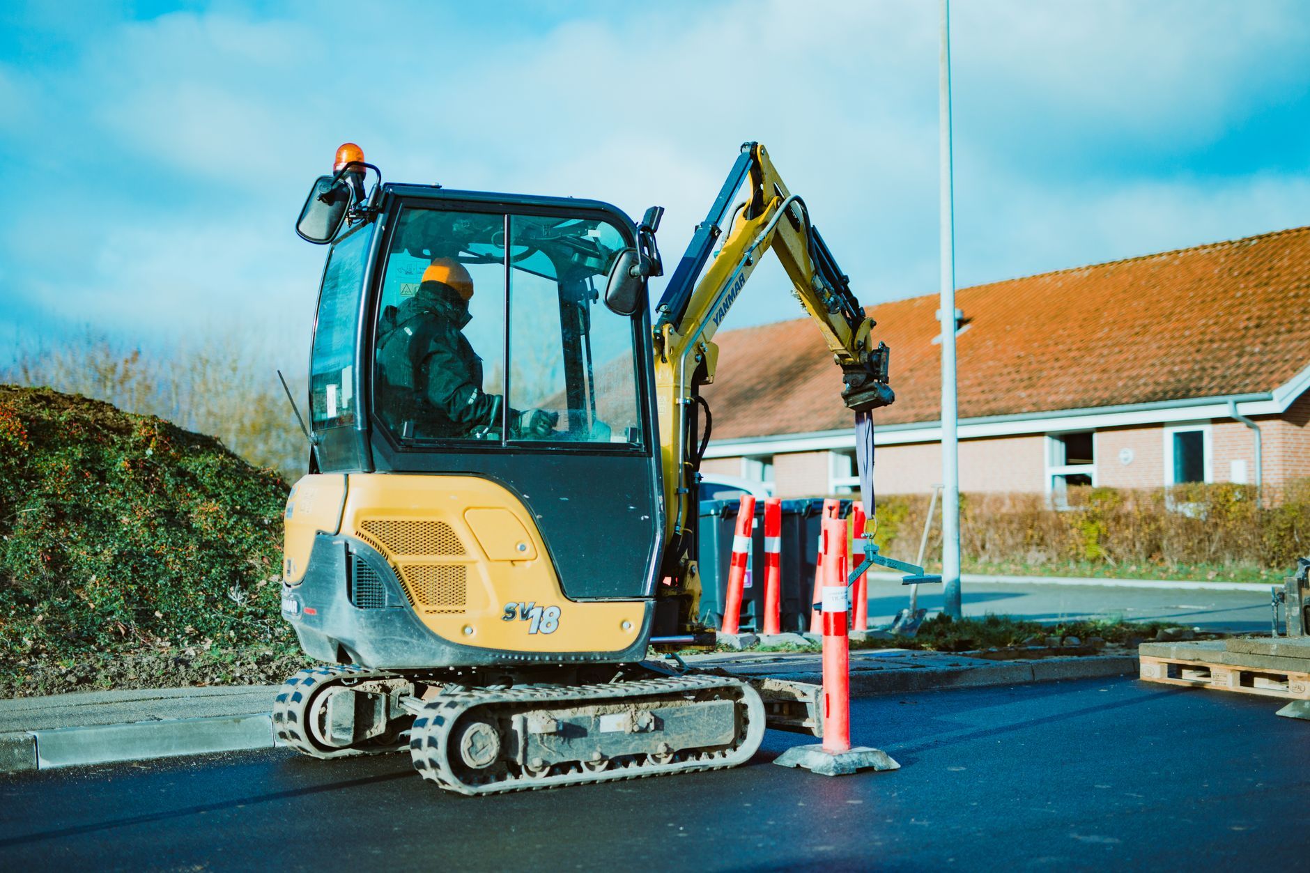 Commercial landscaping crew and foreman working on a property, the kind of route and client-facing work this interview bank screens for.