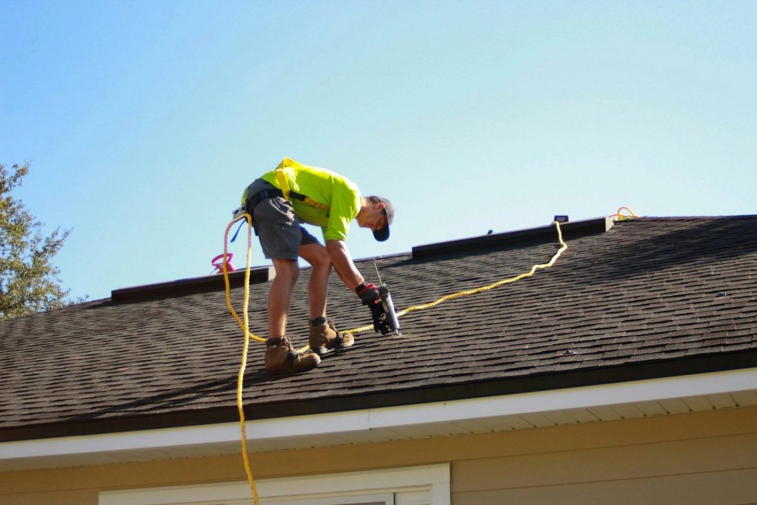 Commercial roofing crew on a rooftop