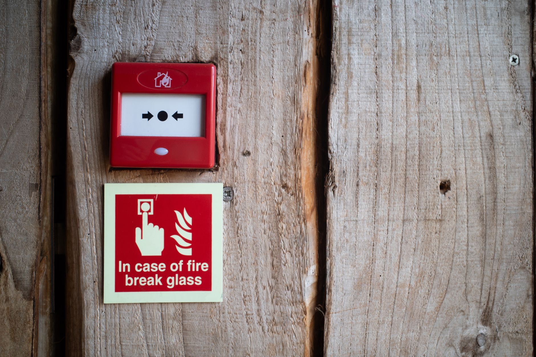 A fire alarm control panel on a wall.