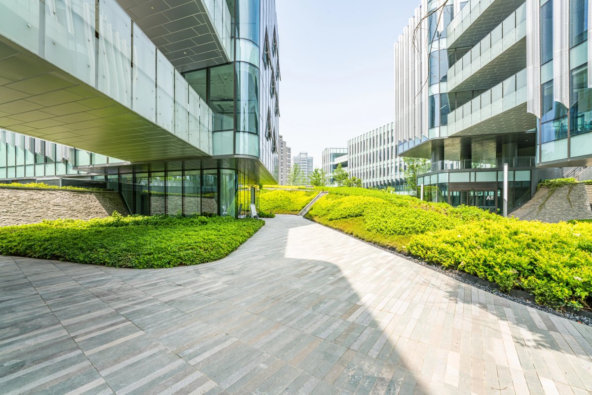 Commercial landscaping crew maintaining corporate grounds — Commercial Landscaping salary guide cover