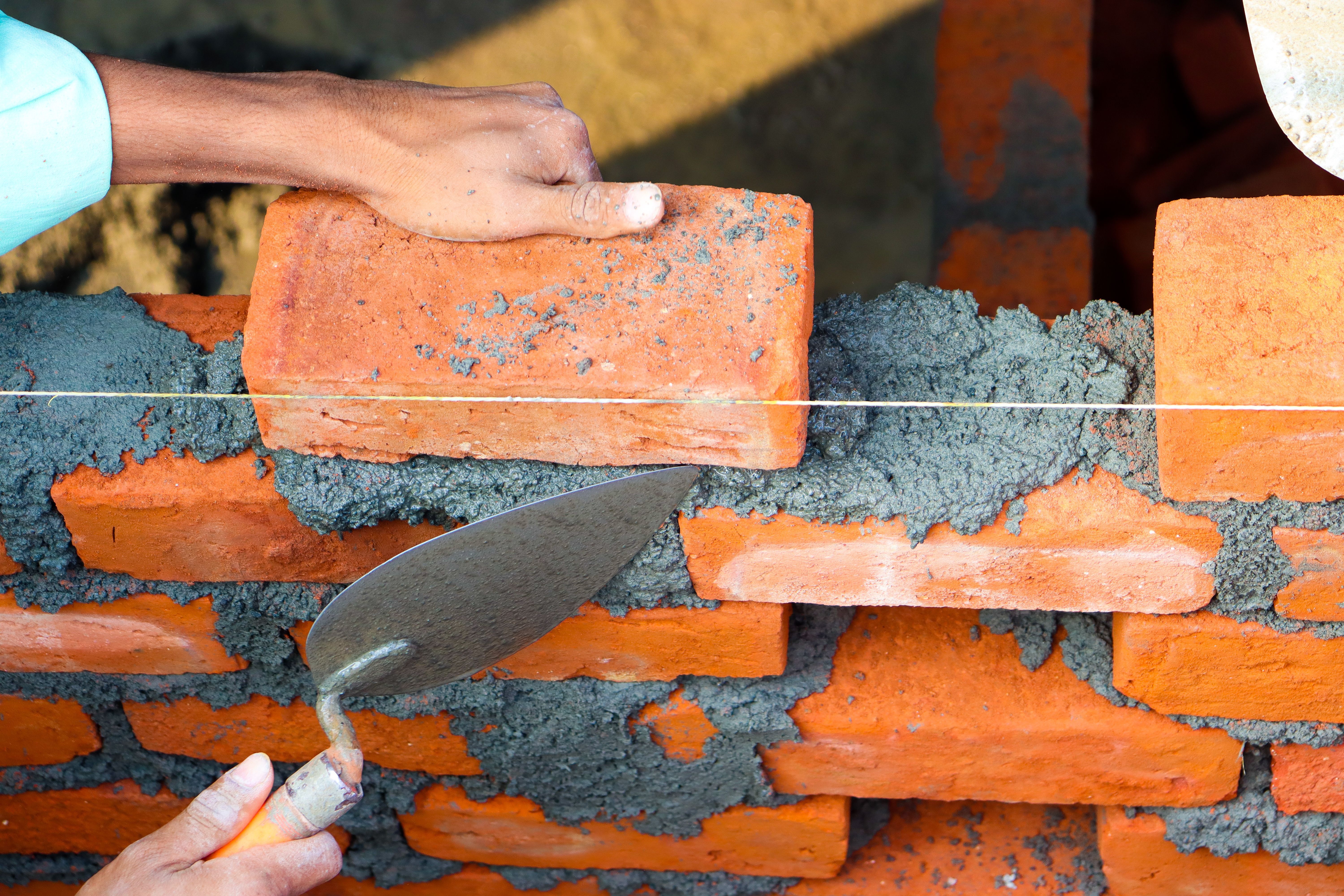 What It Costs to Hire a Mason or Concrete Finisher in 2026