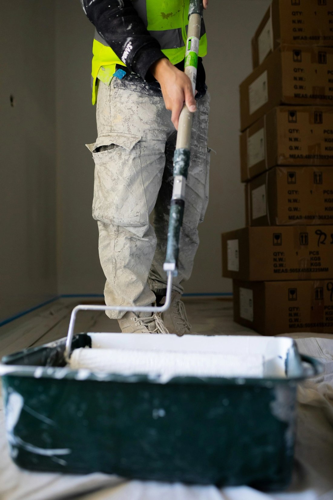 Commercial painter on a lift